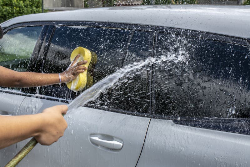  couple washing the car royalty free stock image  couple washing the car royalty free stock image